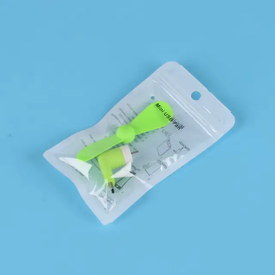 Mini ventilateur USB vert dans emballage